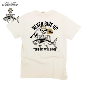 Fishing Skelly Pocket Design on Front w/ Never Give Up on Back - SHORT SLEEVE COMFORT COLORS TEE